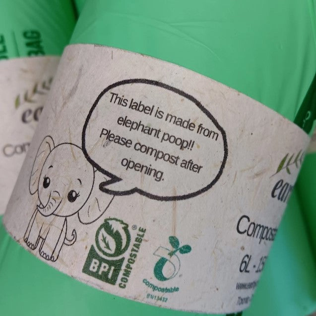 Close-up of Earthly compostable garbage bags label made from elephant poop with BPI and EN 13432 compostable certification logos