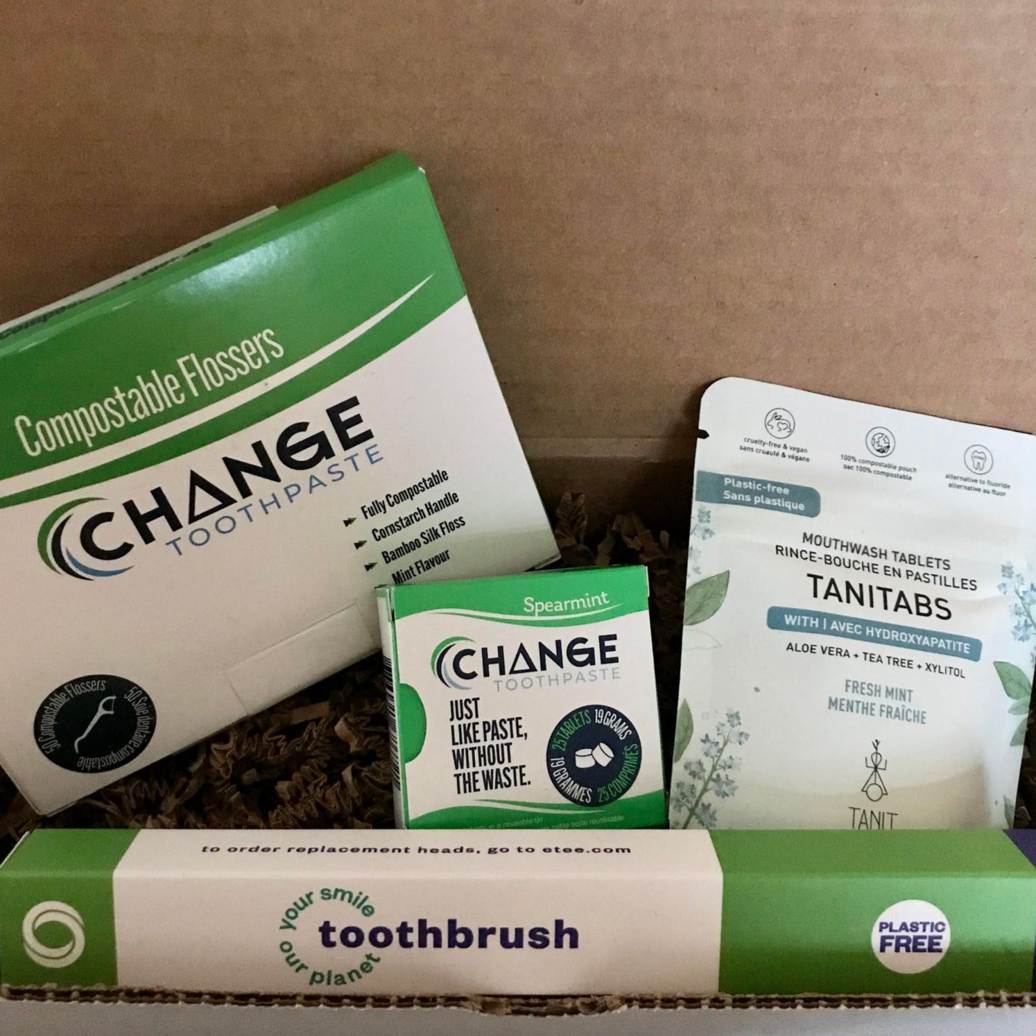 Each Canadian Dental Care Kit includes a 50 pack of compostable flossers, fresh mint mouthwash tablets (62 tablets), a replaceable head bamboo toothbrush and fluoride spearmint toothpaste tablets (65 tablets).