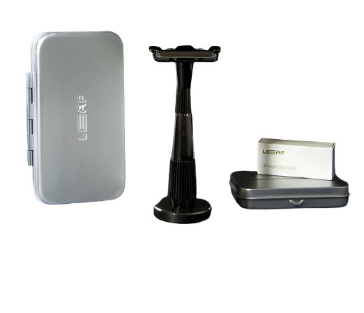 Thorn Razor Kit in Mercury by Leaf Shave featuring single-edge razor, travel case, blade recycling tin, and 50-blade refill pack on white background