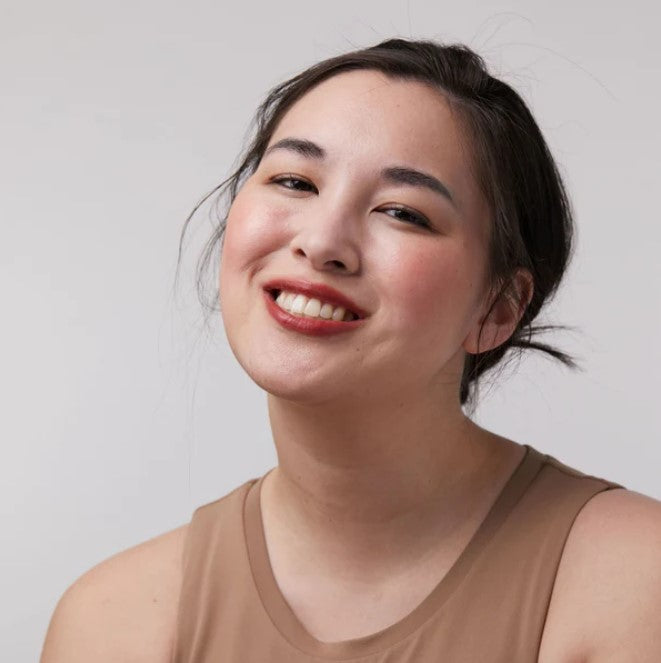 A warm burnt orange  lip and cheek tint colour made in Canada by Birch Babe.