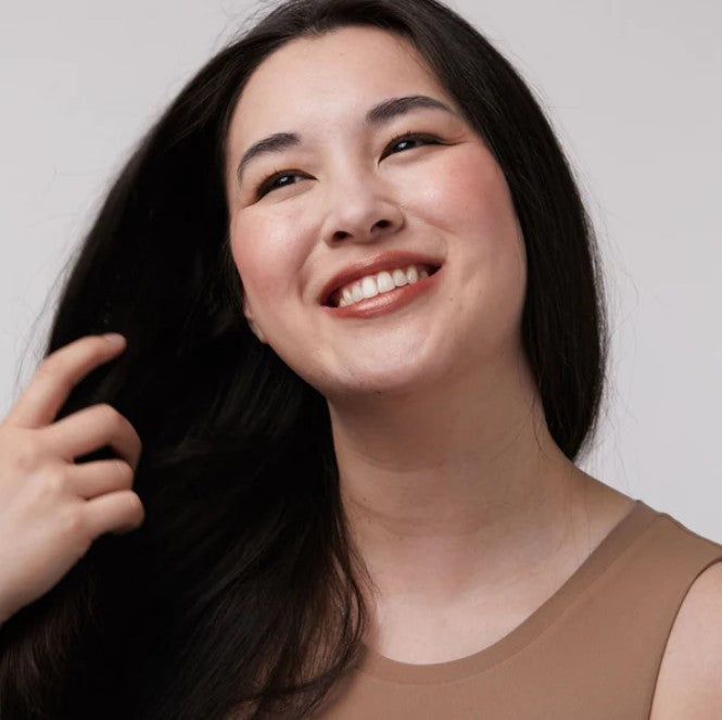 A dusty rose  lip and cheek tint colour made in Canada by Birch Babe.