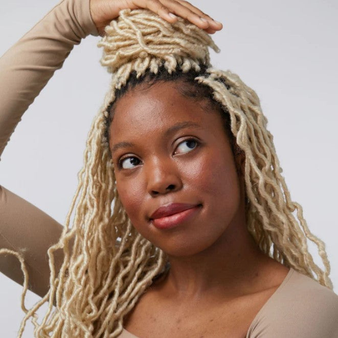 A warm burnt orange lip and cheek colour by Birch Babe.