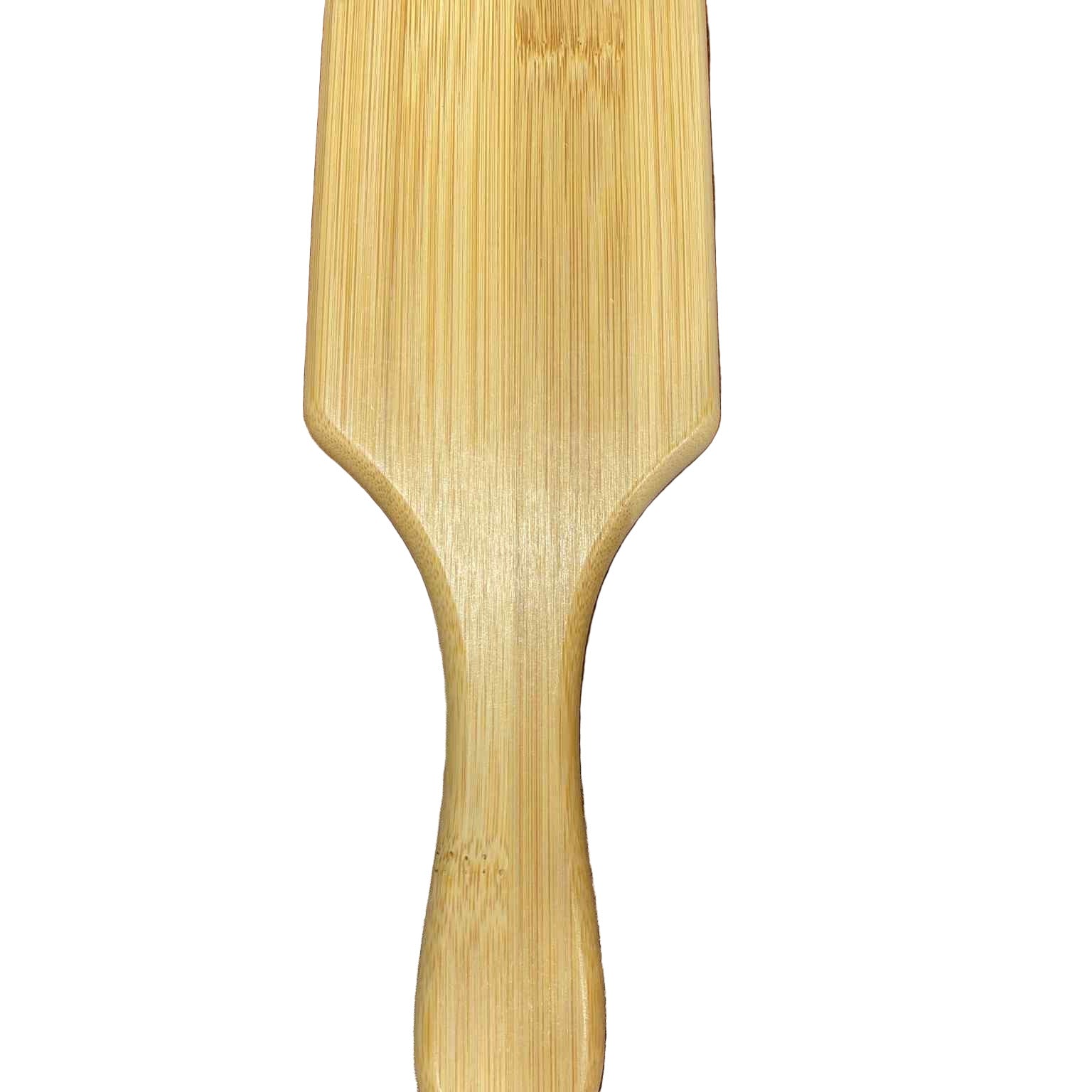 Sustainable bamboo hair brush by Earthly Change showing smooth, durable wooden back and ergonomic handle