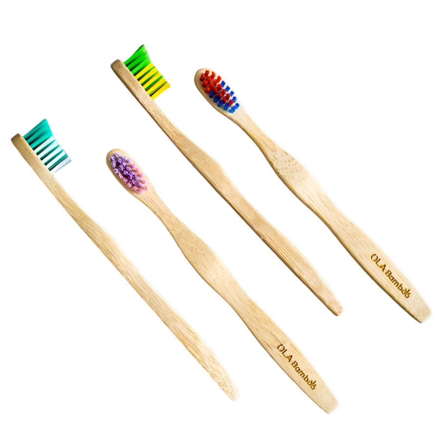 Canadian-made OLA Bamboo Toothbrush Set of 4 for children - the toothbrushes teal/white, red/blue, yellow/green and pink/purple are individually shown on a white background