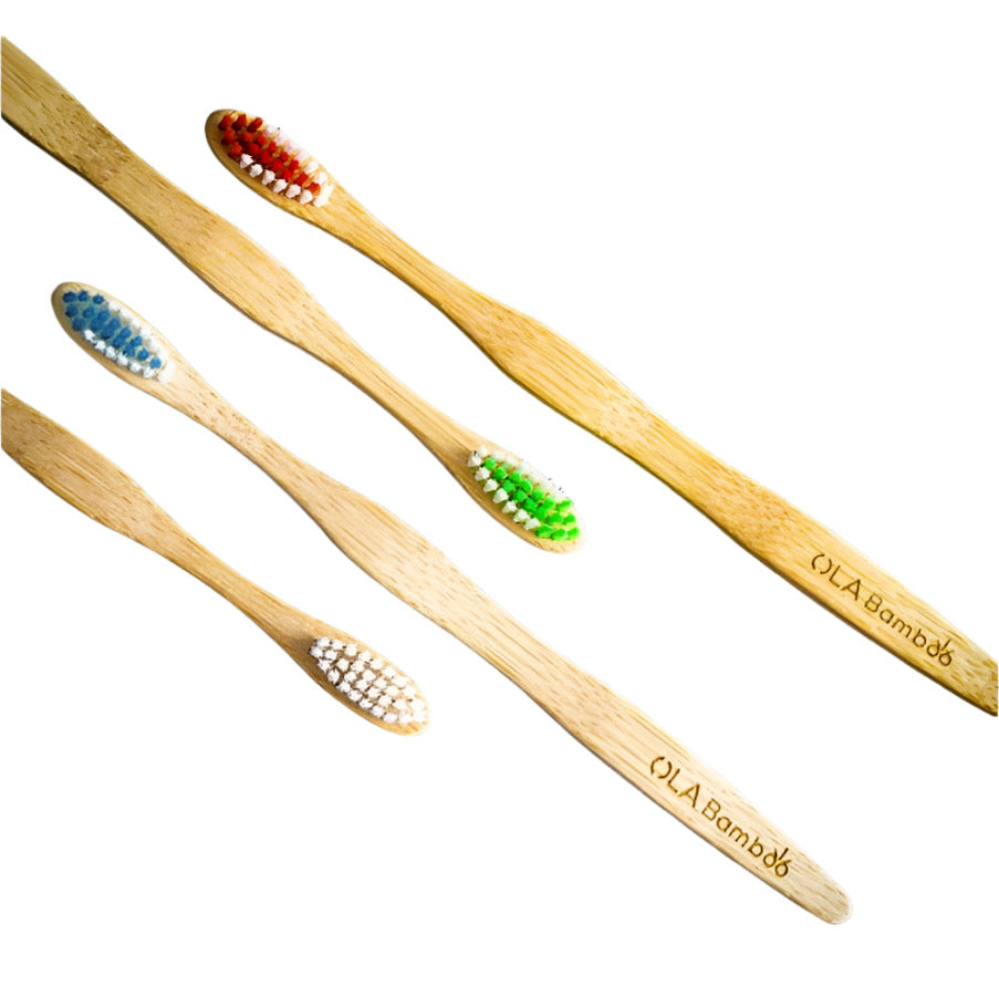 Canadian-made OLA Bamboo Toothbrush Set of 4 - the toothbrushes in red, blue, green and white brush heads are shown individually on a white background,