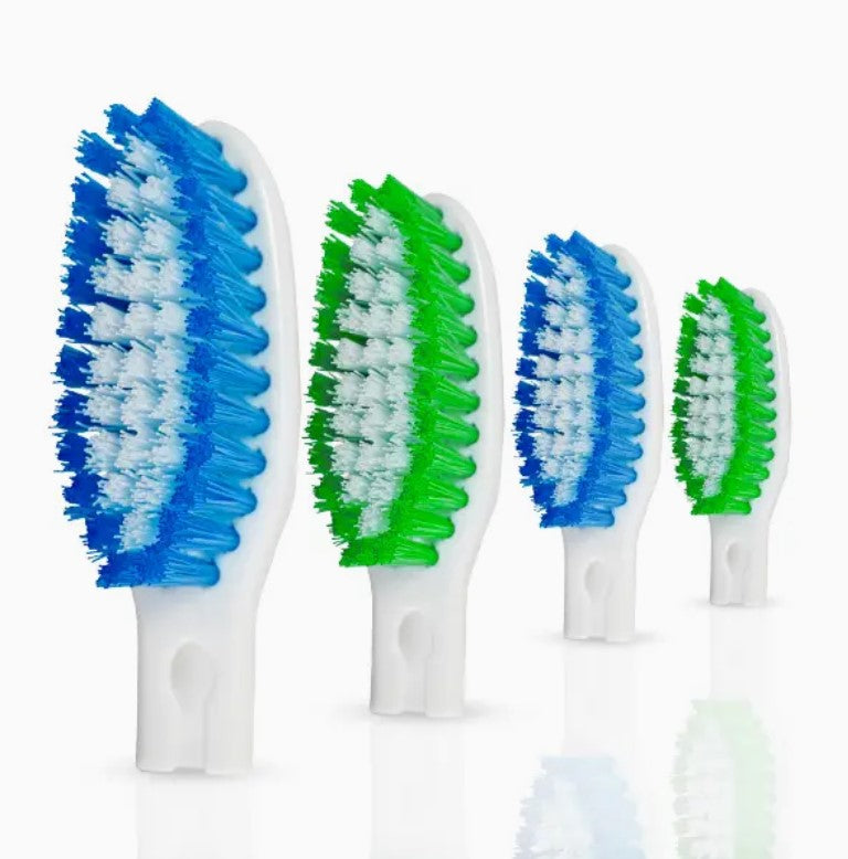 Green and blue Zerro toothbrush replacement heads in a 4-pack, soft-bristle eco-friendly snap-on brush heads for reusable Canadian-made toothbrush handles.