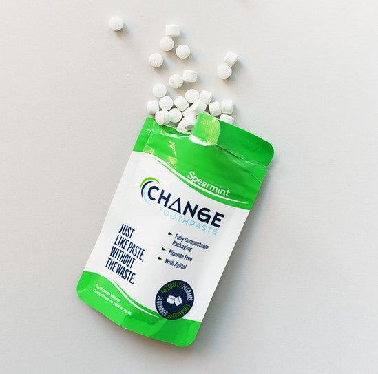 Change Toothpaste tablets in a spearmint flavour come in either a fluoride or fluoride-free option and are an earth-friendly way to care for your teeth. These Canadian-made tablets are just like regular toothpaste but without the waste. They come packaged in either a compostable 1 month (65 tablet) or 3 month tablet (195) pouch, a sample size (10 tablets) or in an aluminum travel tin of 25 tablets.