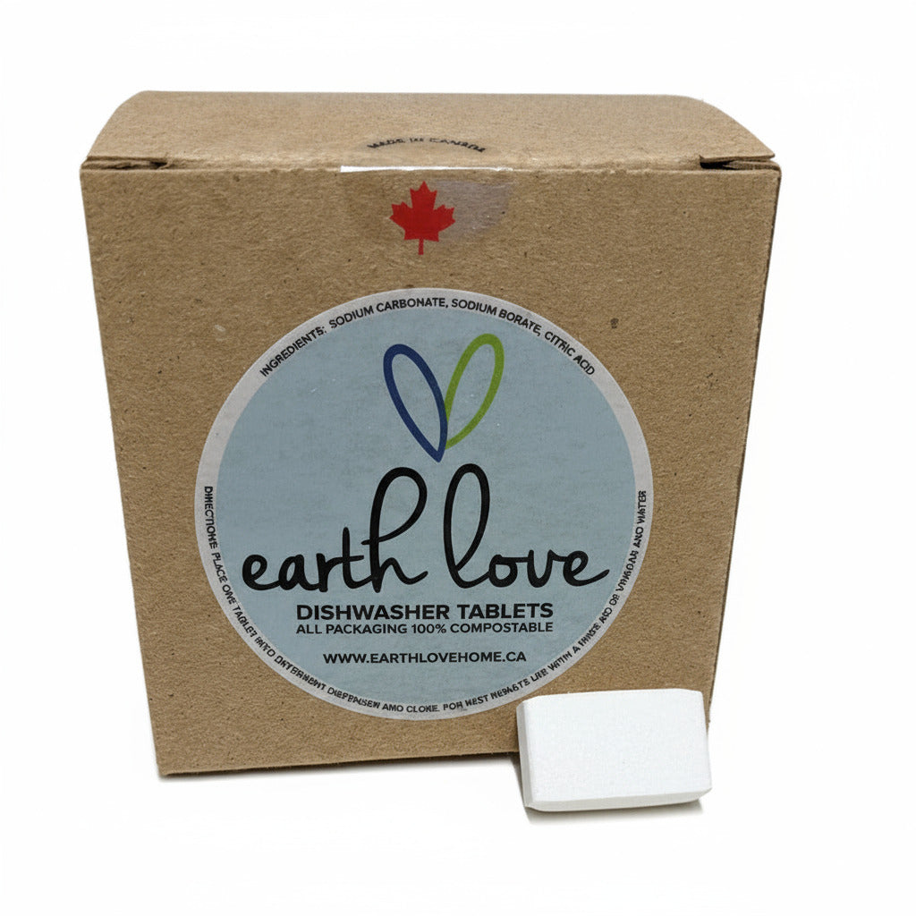 Earth Love Dishwasher Tablets – Canadian-made zero-waste dishwasher detergent tablets in 100% compostable packaging, shown with a single tablet in front of the box.