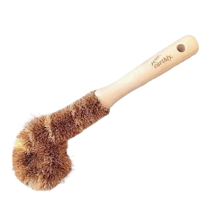 Eco-friendly compostable bottle brush by Earthly Change with curved bamboo handle and durable sisal bristles.