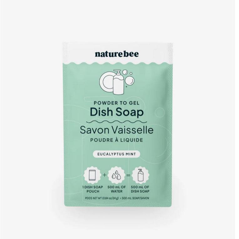 A packet of eucalyptus mint nature bee powder to gel dish soap on a white background. This single dish soap pouch when added to 500 ml of water makes 500 m of dish soap.