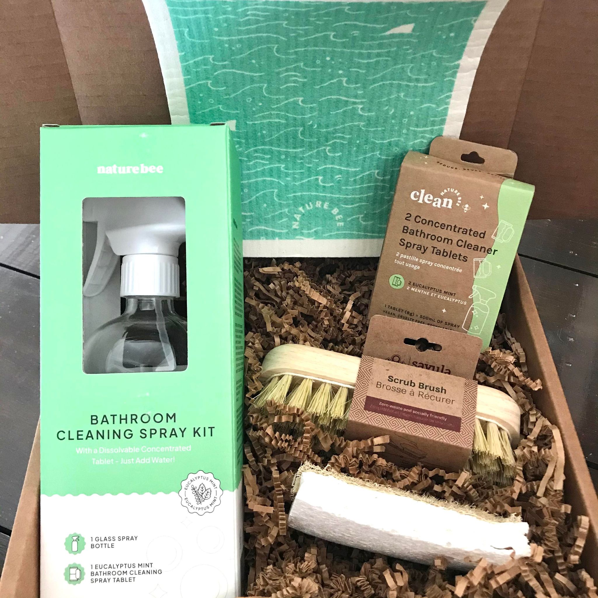 This Nature Bee Clean gift set included a eucalyptus mint bathroom cleaning spray kit, a two pack of concentrated bathroom cleaner tablets, a Sayula scrub brush and an compostable eco sponge which is a combination loofah and celluose sponge