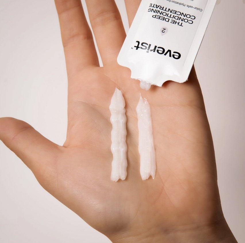 Everist Deep Conditioning Concentrate creamy texture sample shown on hand for eco-luxury haircare