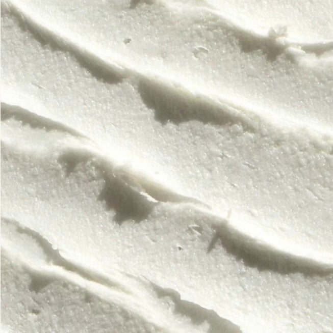 Close-up of Everist Haircare Concentrates Travel Kit label on a sleek sample tube, highlighting clean design and ingredient