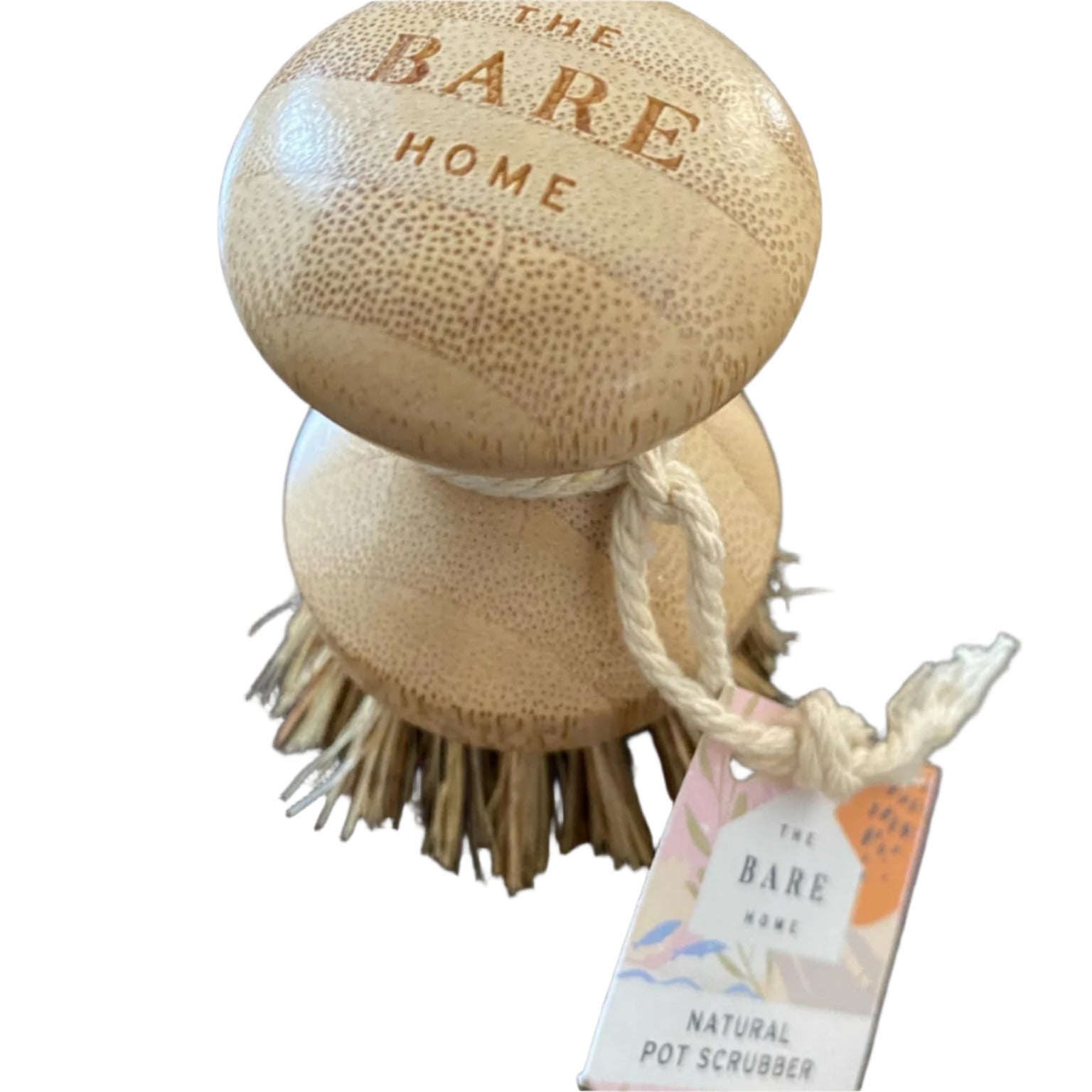 Wooden pot scrubber with bristles and 'The Bare Home' branding on a white surface.