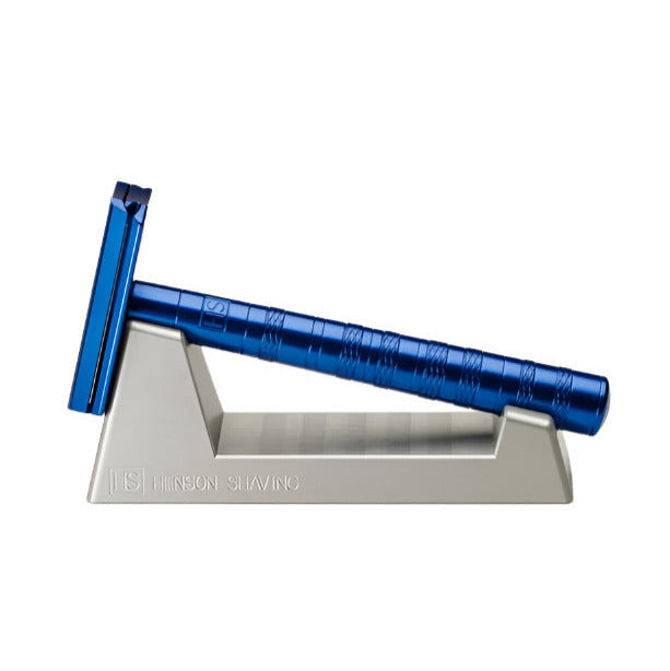Steel blue Henson Razor featured on anodized aluminum razor stand