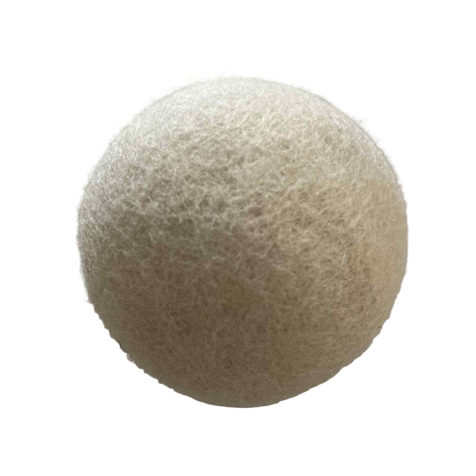 Close-up of single natural white wool dryer ball – eco-friendly, reusable, and compostable laundry alternative