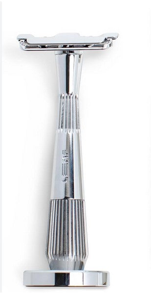 Chrome Leaf Shave Thorn Razor displayed upright on matching metal stand