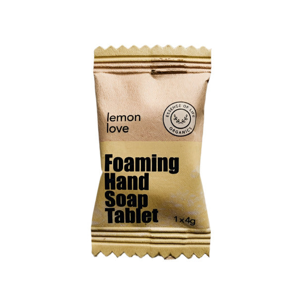 Essence of Life Organics Lemon Love Foaming Hand Soap Tablet in biodegradable packaging on a white background. A zero-waste, plant-based hand soap alternative made in Canada.