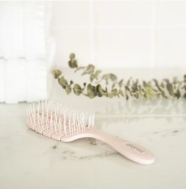 Light Pink Myni Wheat Straw Hair Brush is perfect to use in the shower if you want to brush your hair while conditioning it.