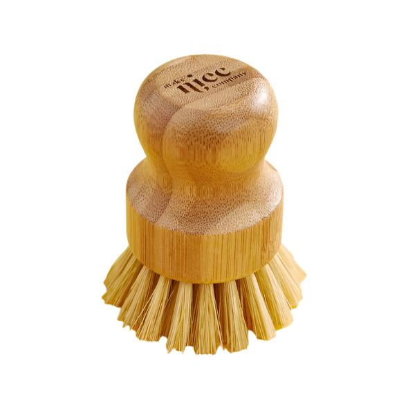 This small, powerful 100% biodegradable pot scrubber brush from the Make Nice Company is perfect for scrubbing dishes and soft enough to not scratch your favourite plate.