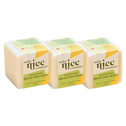 Three labelled unscented solid dish soap cubes weighing 240 g each sit side by side on a white background. This zero waste dish soap is made in Canada by the Make Nice Company