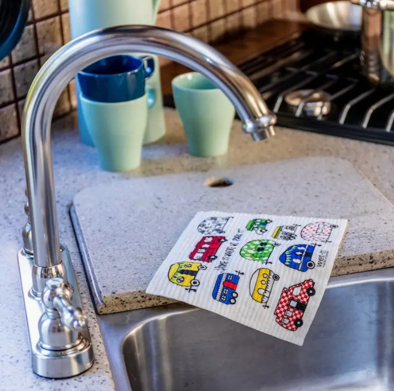 My RV Wet It Swedish Dishcloth on RV kitchen counter next to faucet – eco-friendly reusable cloth for cleaning