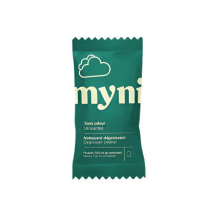 Green packet of 'myni' cleaner on a white background