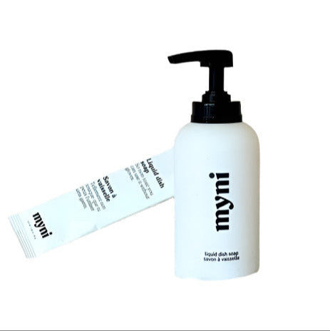 Clean tough messes naturally with Myni's non-toxic dish soap in a classic styled compostable wheat straw bottle with black lettering on a white background.