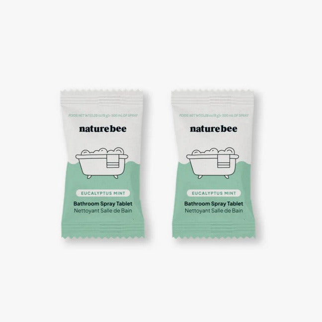 Two-pack of Nature Bee Eucalyptus Mint Bathroom Spray Cleaning Tablets in zero-waste wrappers for sustainable bathroom cleaning.