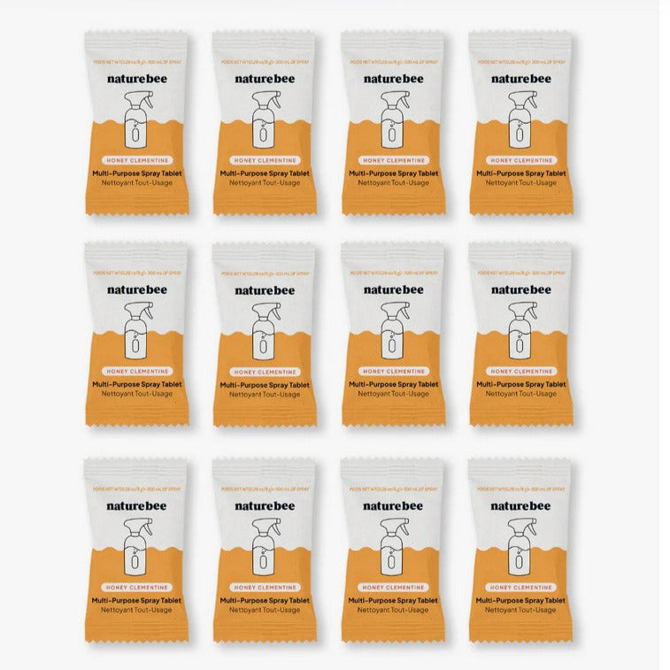 Bulk pack of 12 Nature Bee Honey Clementine Multi-Purpose Cleaning Tablets in orange and white compostable wrappers