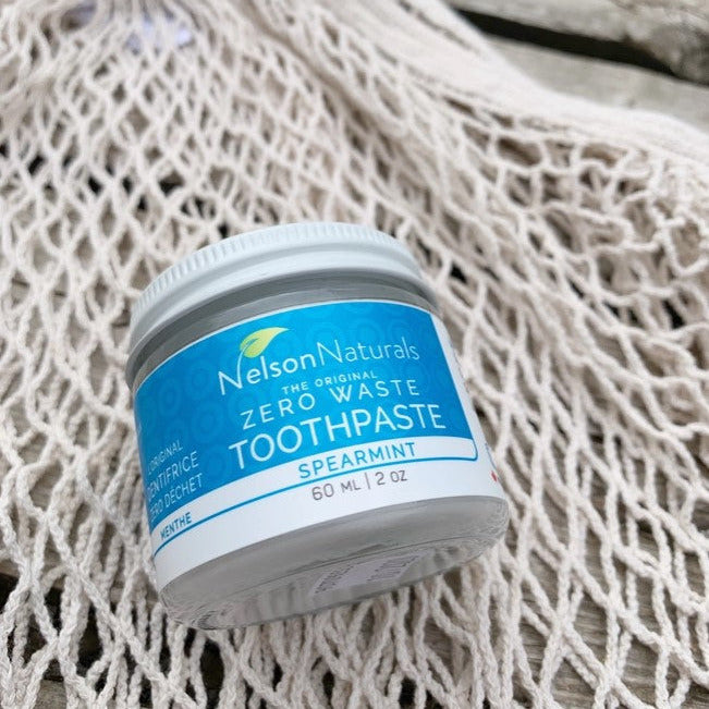 Nelson Naturals Spearmint Toothpaste in a Jar placed on a reusable mesh bag – plastic-free, Canadian-made oral care