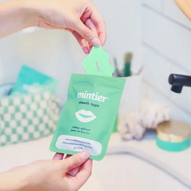 Hand opening Mintier Mouth Tape eco-friendly pouch – natural sleep aid strips