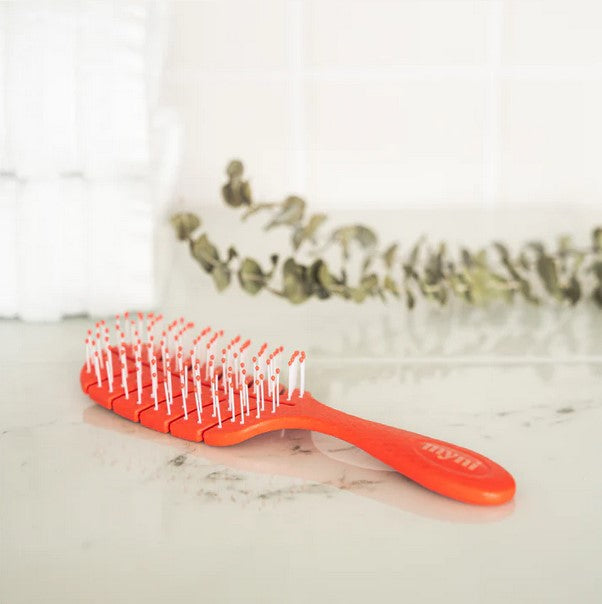 Pink Myni Wheat Straw Hair Brush is perfect to use in the shower if you want to brush your hair while conditioning it.