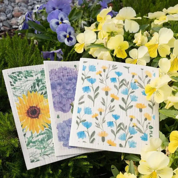 Introducing the Floral Bursts Swedish Sponge Cloth set in sunflower, aster and hydrangea motifs by the Canadian brand Plantish inspired by flowers, their vibrance and chemistry in bloom.