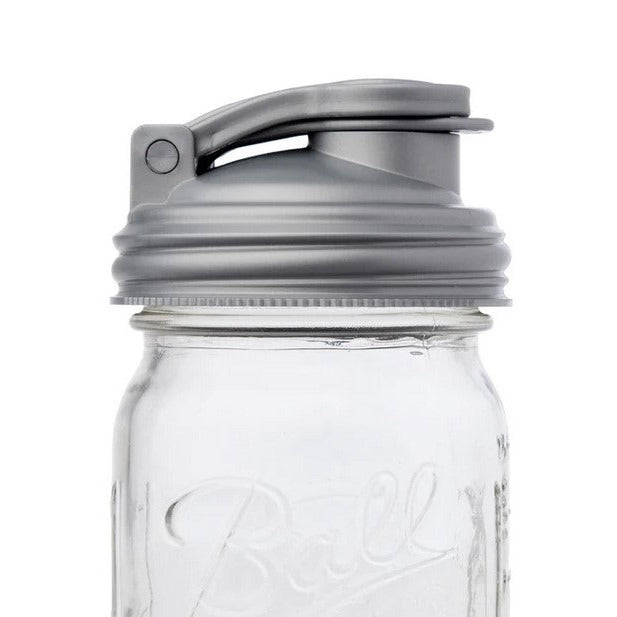 reCAP Mason Jar POUR Lid in grey on a clear Ball Mason jar – eco-friendly reusable pour spout for liquids and dry goods