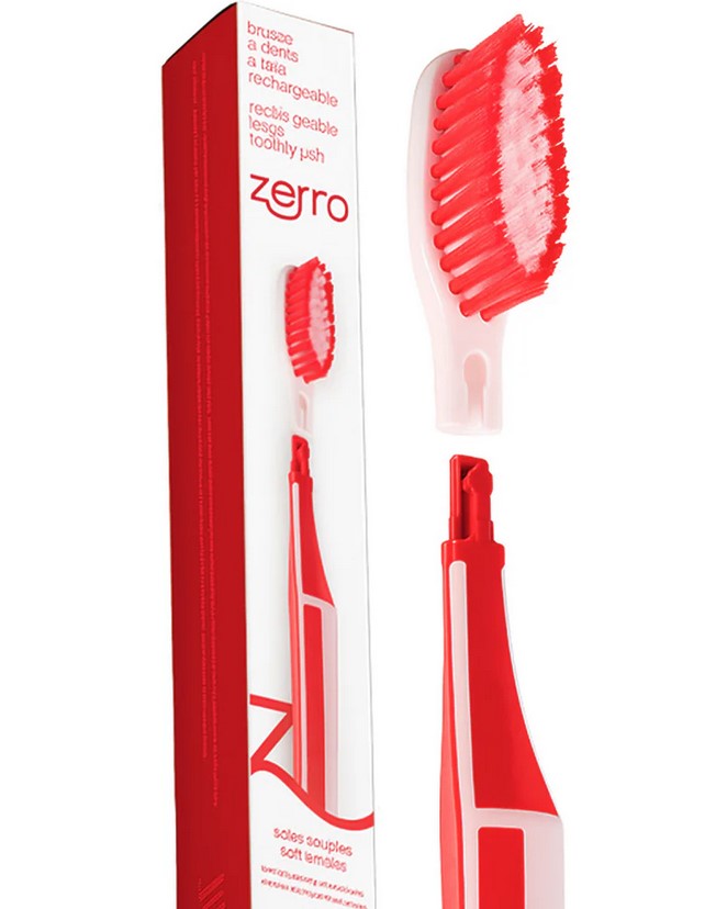 Zerro Replaceable Head Toothbrush in red with soft bristles and reusable handle, Canadian-made eco-friendly toothbrush shown with packaging and snap-on replacement head.