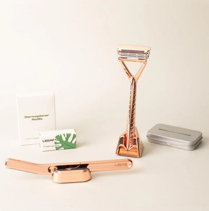 Leaf Face and Body Set in Rose Gold Kit – includes reusable safety razor, dermaplaner, blade refills, and metal recycling tin for sustainable skincare and shaving