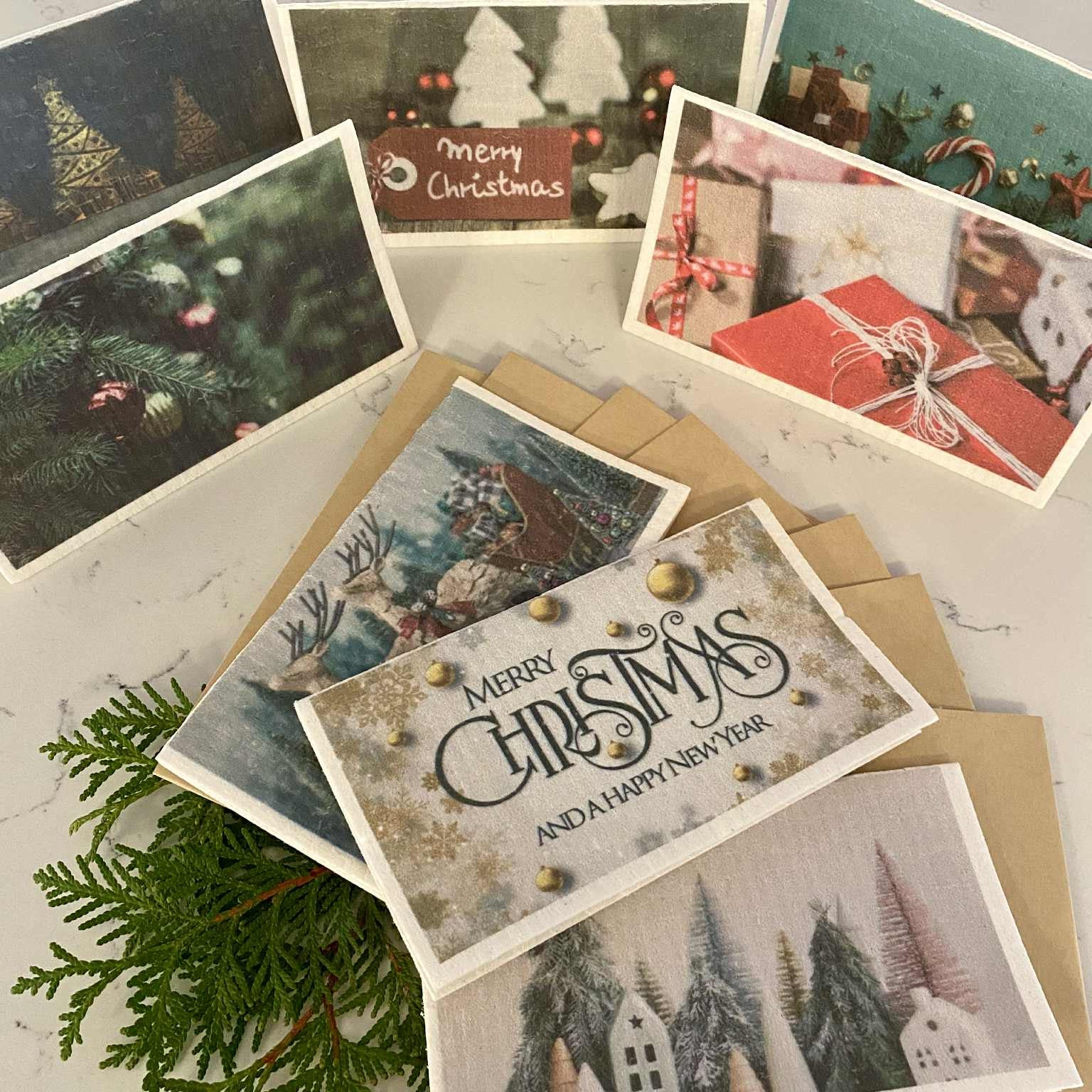 Set of 8 Swedish dishcloth Christmas cards with envelopes – eco-friendly holiday greeting cards made from natural cellulose and cotton, reusable, compostable, and sustainable.