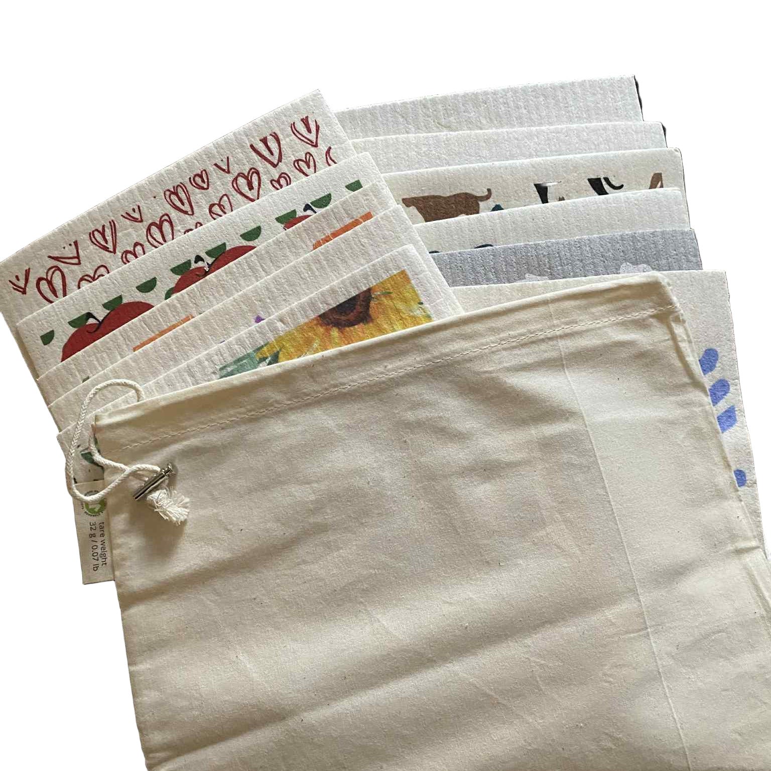 Reusable Swedish Dishcloth Mystery Set of 12 displayed in a cotton drawstring bag, featuring colourful eco-friendly patterns for sustainable cleaning and gifting.