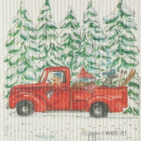 This Wet-it! Swedish dishcloth features a red truck with a dog driving with a dog and cardinal in the back with blankets and skis. It is made of high-grade cotton and cellulose pulp with a special weave that makes this reusable and compostable cloth highly absorbent - up to 16x it's weight!