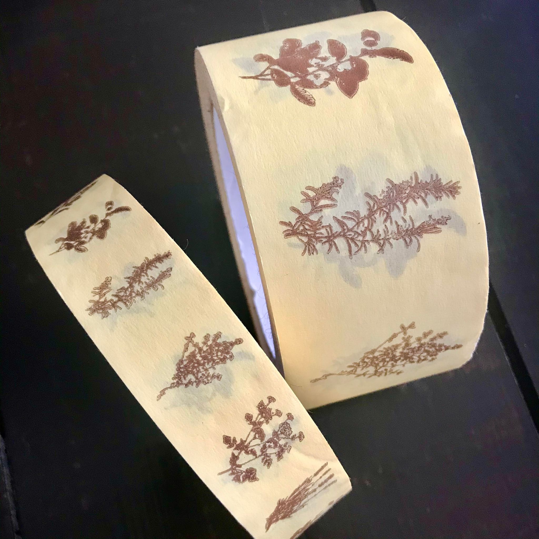 Goldrick Natural Living 25 and 50 mm light yellow recyclable paper tape printed with a wild herb pattern