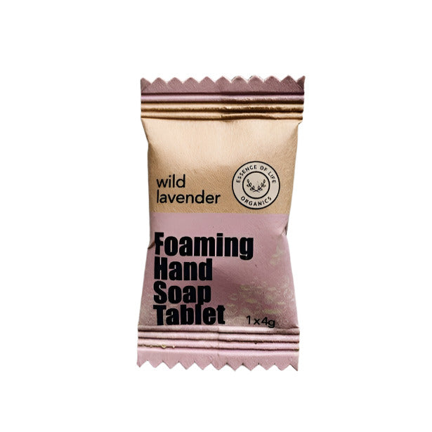 Essence of Life Organics Wild Lavender Foaming Hand Soap Tablet in biodegradable packaging on a white background. A zero-waste, plant-based hand soap alternative made in Canada.