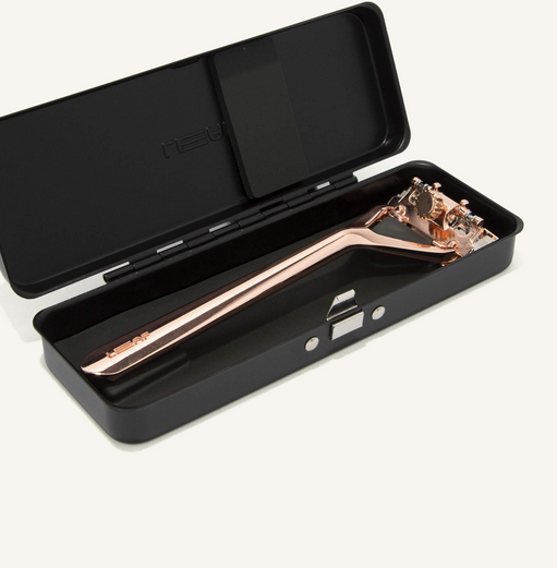 Sample of what a rose gold leaf shave razor looks like in a black leaf travel case