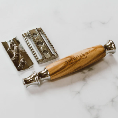 reusable chrome and olive wood razor can be easily be taken apart for cleaning