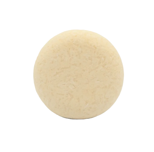 Unpackaged orange patchouli scented shampoo bar for dry curly hair made in Canada by good juju