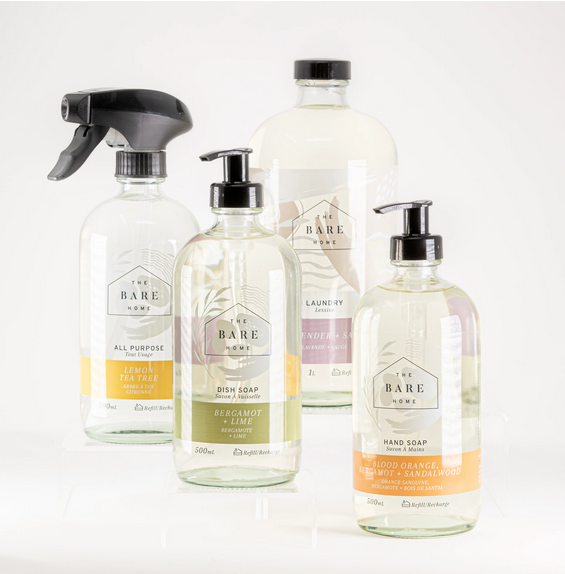 The Bare Home Complete Kit includes four eco-sustainable essential oil scented natural liquid household products made in Canada - laundry detergent, hand soap, dish soap and all purpose cleaner in refillable glass bottles