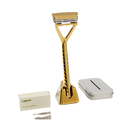 The Leaf Shave 'Gold' Kit includes a pivoting head razor, leaf razor stand, pack of 50 single edge blades and a blade recycling tin