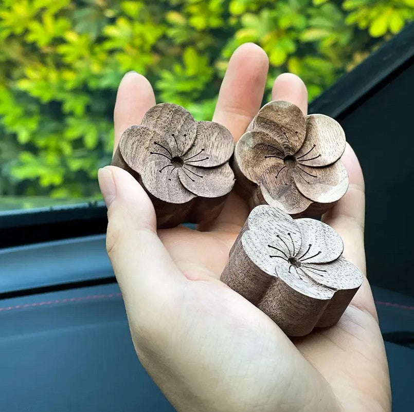 wooden essential oil diffuser in a flower shape is sold individually and needs no electricity to operate