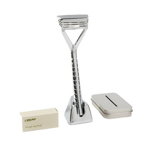 Chrome Leaf Razor Kit with pivoting head razor, stand, 50 single-edge blades, and blade recycling tin – eco-friendly shaving set by Leaf Shave.