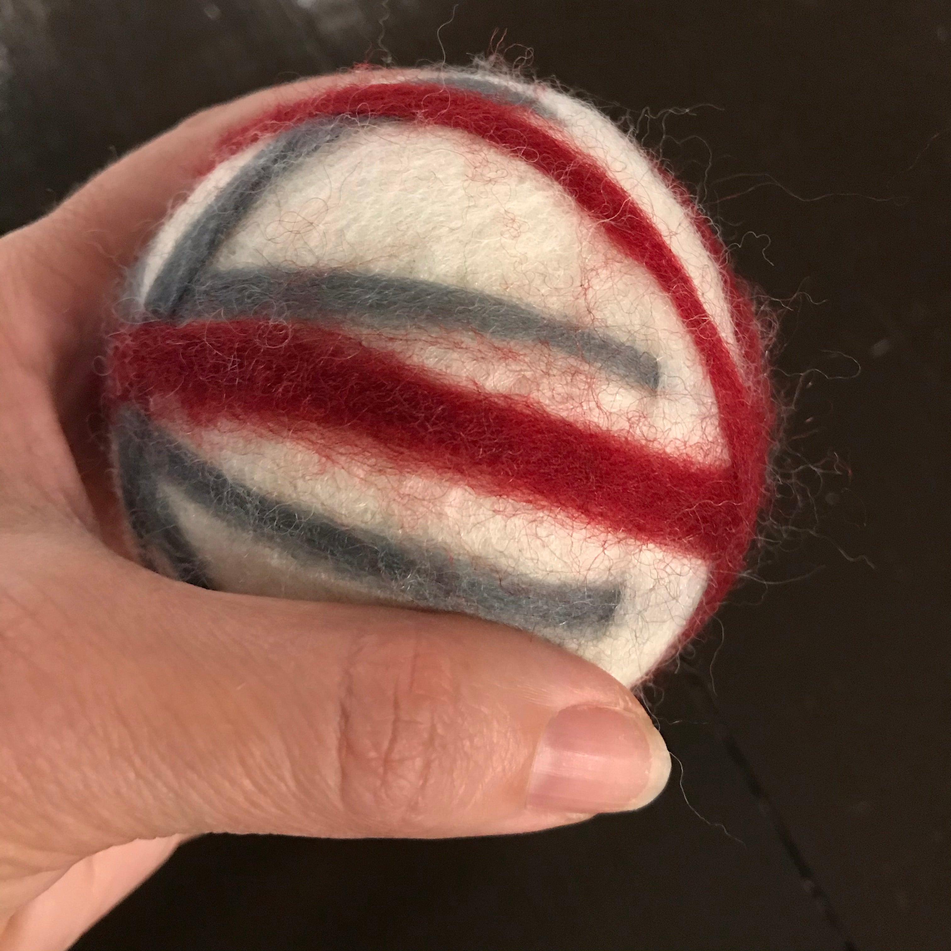 large canadian made white, red and grey 100 percent wool dryer ball sold individually